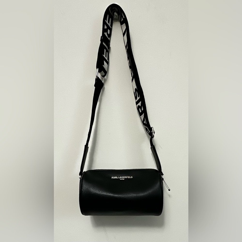 Karl Lagerfeld Paris Black Pebbled Barrel Crossbody Bag with Logo Guitar Strap - Picture 4 of 13